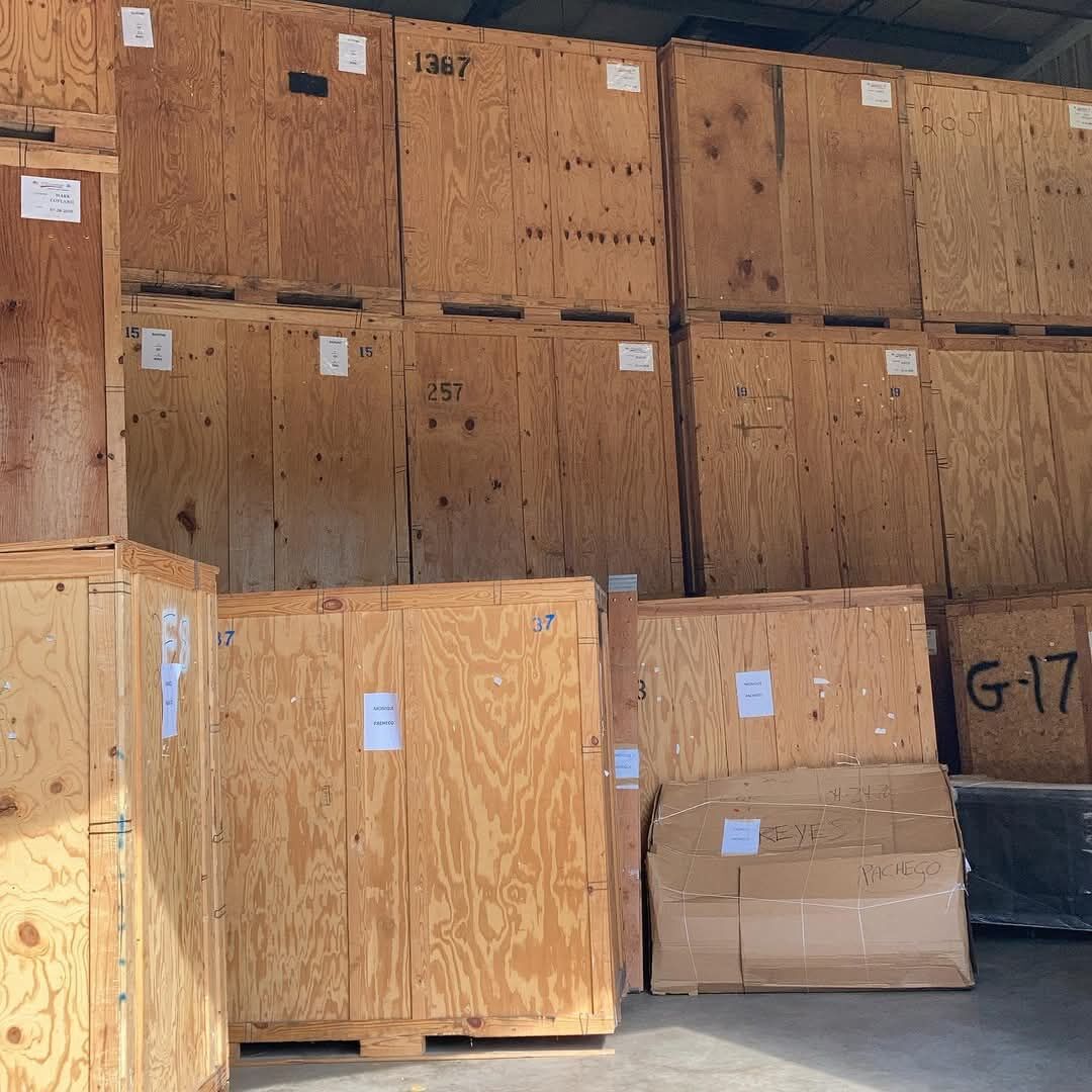 Rows of wooden vault storage crates in climate-controlled warehouse — Carrollton, TX
