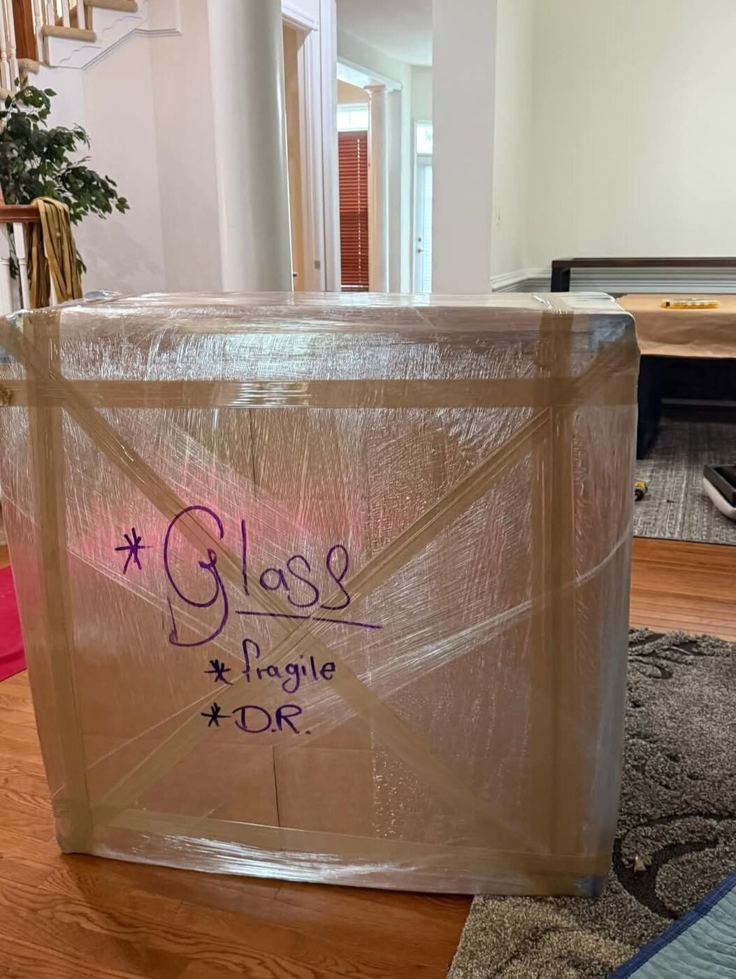 Fragile glass item labelled and wrapped with protective materials — Dallas movers
